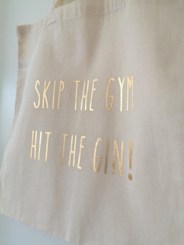 close up of natural tote bag with quote Skip the gym, Hit the Gin!