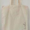 Natural coloured tote bag with the word bride in pink lettering