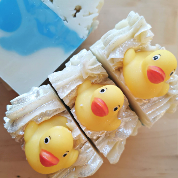 Handmade blue and white soaps with little rubber duckies